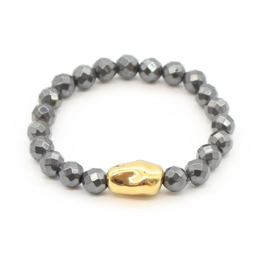 Pulsera hematita con perla dorada